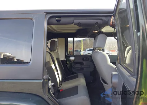 2010 Jeep Wrangler Unlimited Sahara from USA, damaged, VIN 1J4BA5H11AL223139